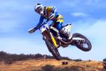 Ashley Fiolek met poigne dans l'angle avec la Husqvarna TC 125cc 